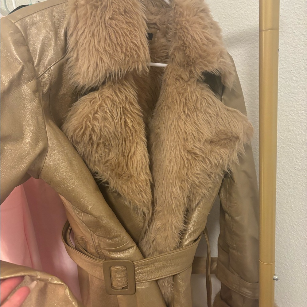 Gold leather with faux fur so gorge the jacket is real leather